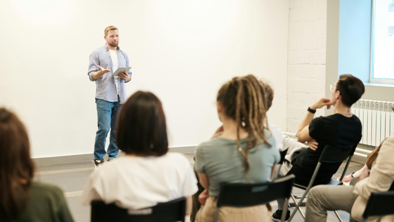 man giving presentation to a group of people